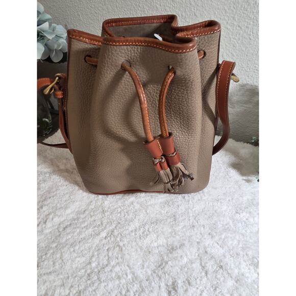 Dooney & Bourke Vintage All-Weather Leather Drawstring Bucket Bag - Picture 1 of 7